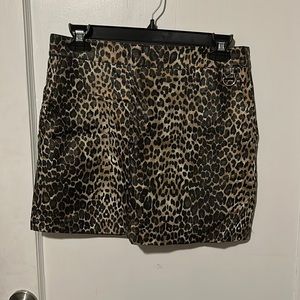 Cheetah print leather mini skirt with pockets